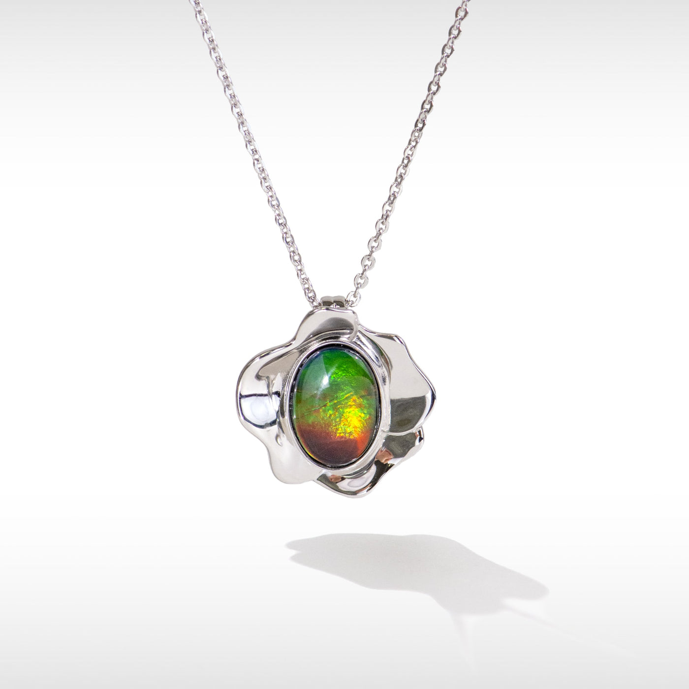 Bloom ammolite pendant and earring set in sterling silver