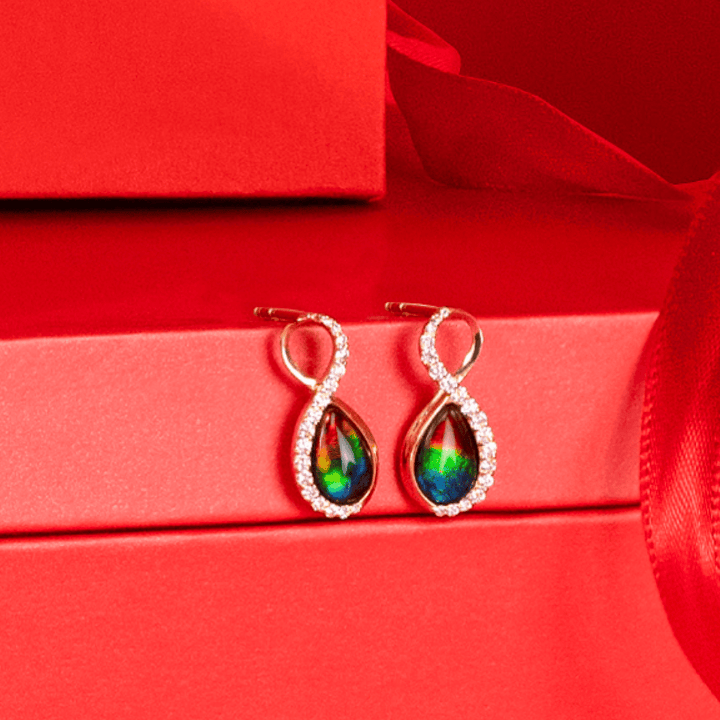 Infinity ammolite earrings in 14K gold with white diamonds