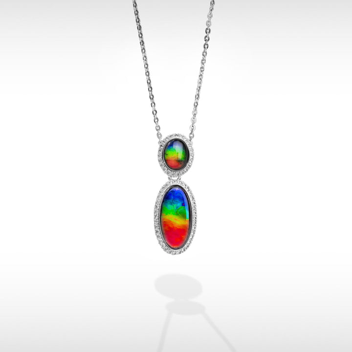 Serene ammolite pendant and earring set in sterling silver