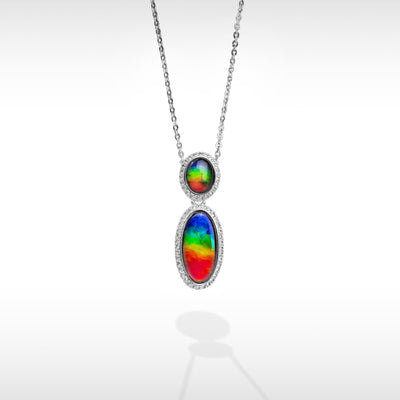 Serene ammolite pendant and earring set in sterling silver