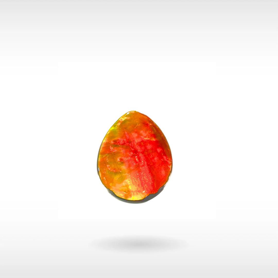 Red, Orange, gold and yellow oval-shaped natural Ammolite gemstone on a white background