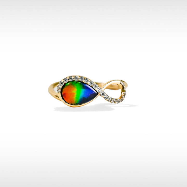 Infinity ammolite ring in 14K gold with white diamonds