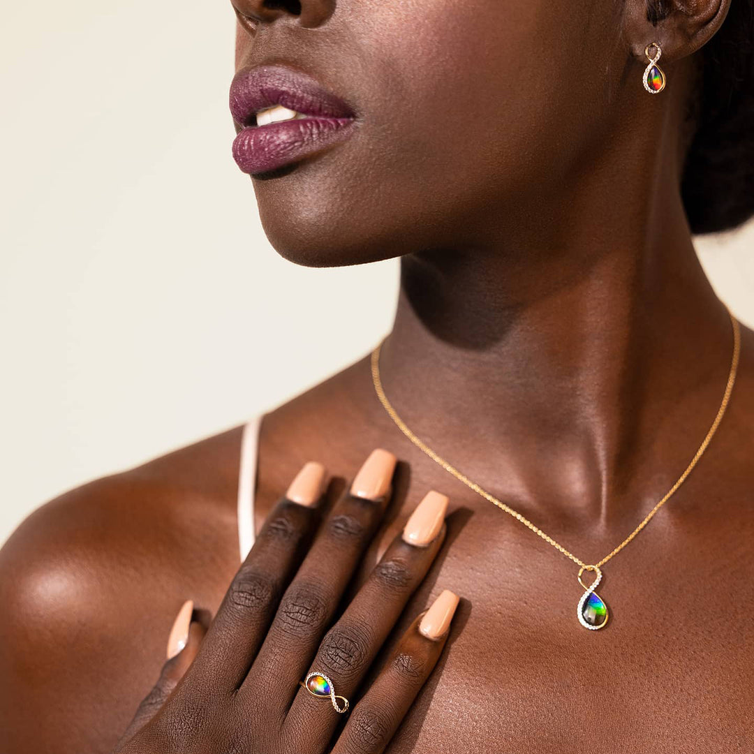 Infinity ammolite pendant in 14K gold with white diamonds