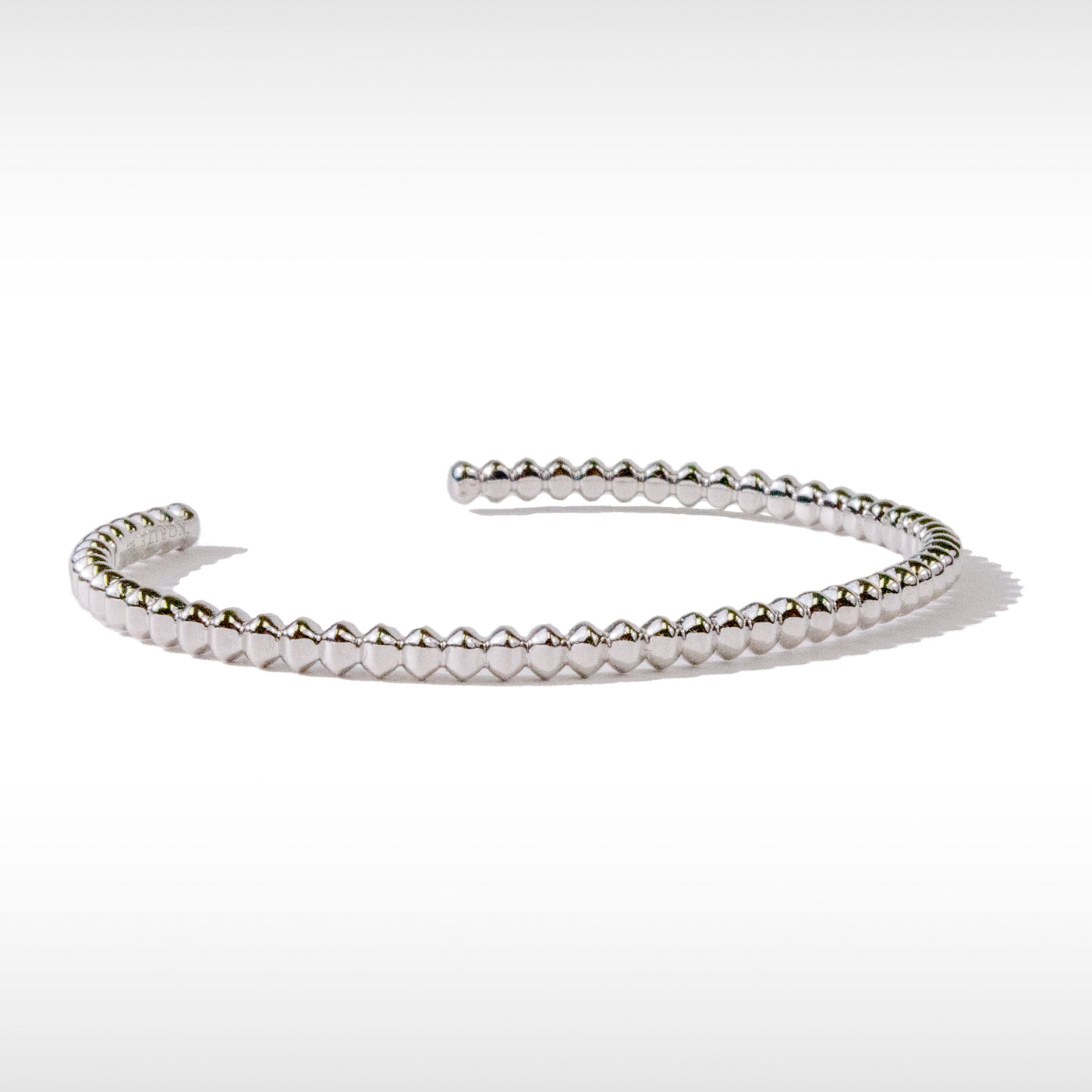 Accents bangle in sterling silver with rhodium plating