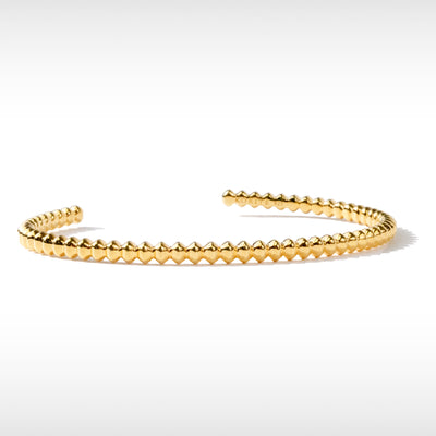 Accents bangle in sterling silver with gold plating